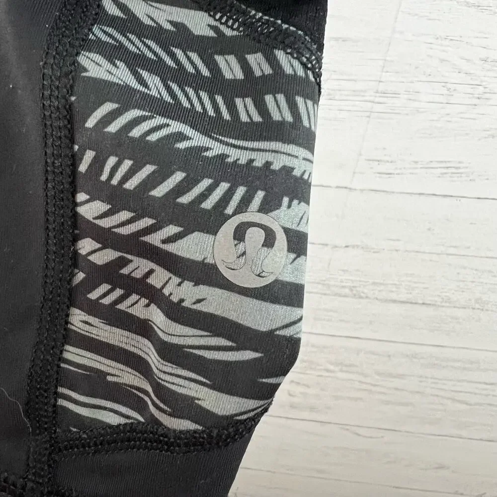 Lululemon Black and Gray Cropped Thigh Pocket‎ Leggings Size 6